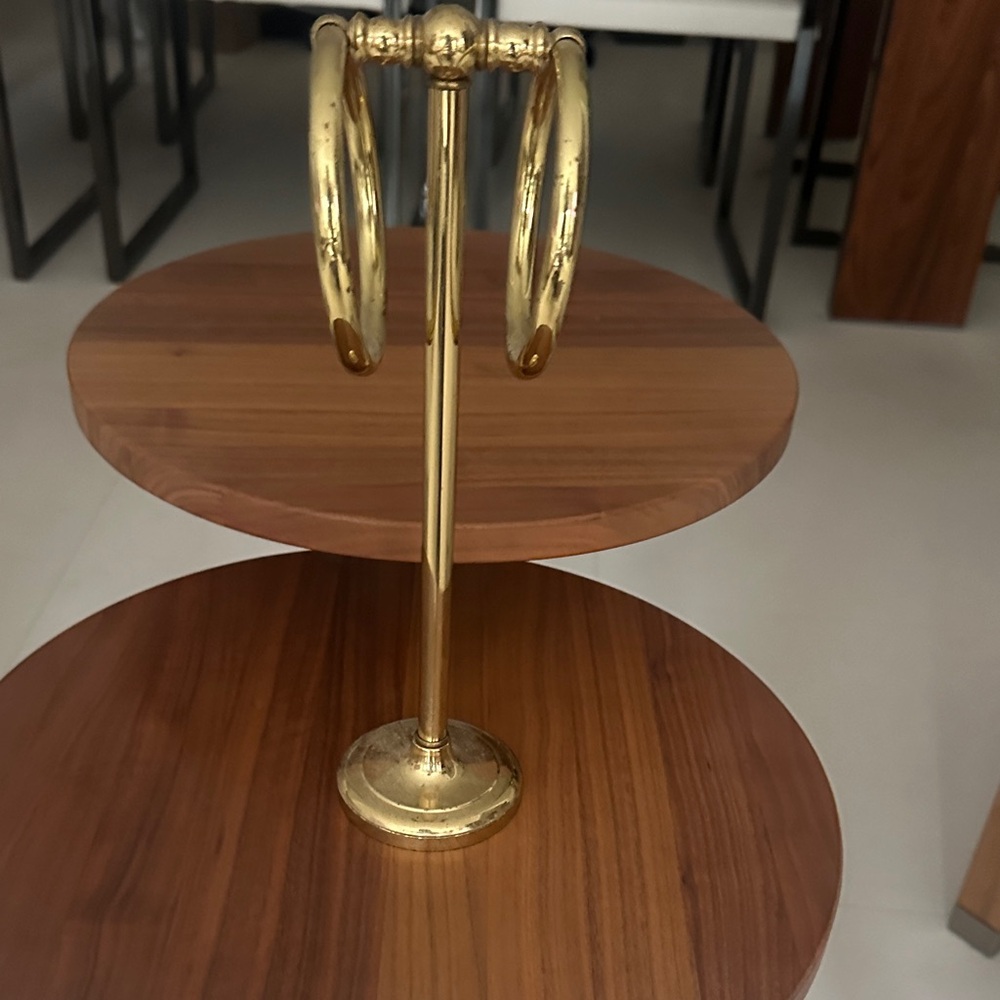 Elegant brass towel holder